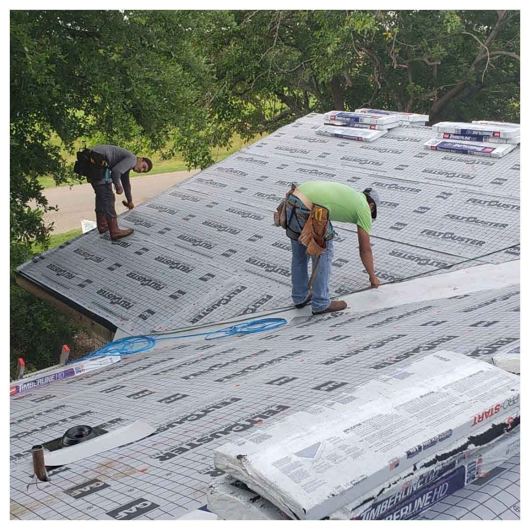 The Amos Roofing crew on a general contracting project